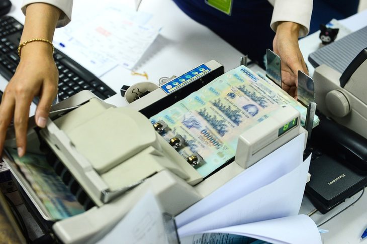 Các ngân hàng thương mại không chỉ gặp khó trong việc cho vay mà còn đối diện với nguy cơ nợ xấu tăng cao - Ảnh: QUANG ĐỊNH Các ngân hàng thương mại không chỉ gặp khó trong việc cho vay mà còn đối diện với nguy cơ nợ xấu tăng cao - Ảnh: QUANG ĐỊNH